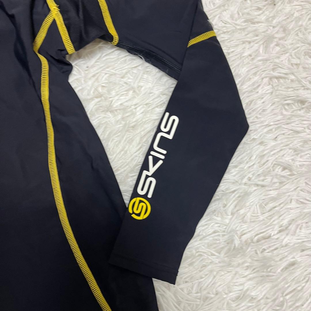未使用 SKINS スキンズ カットソー スポーツ 黄色 ブラック 長袖