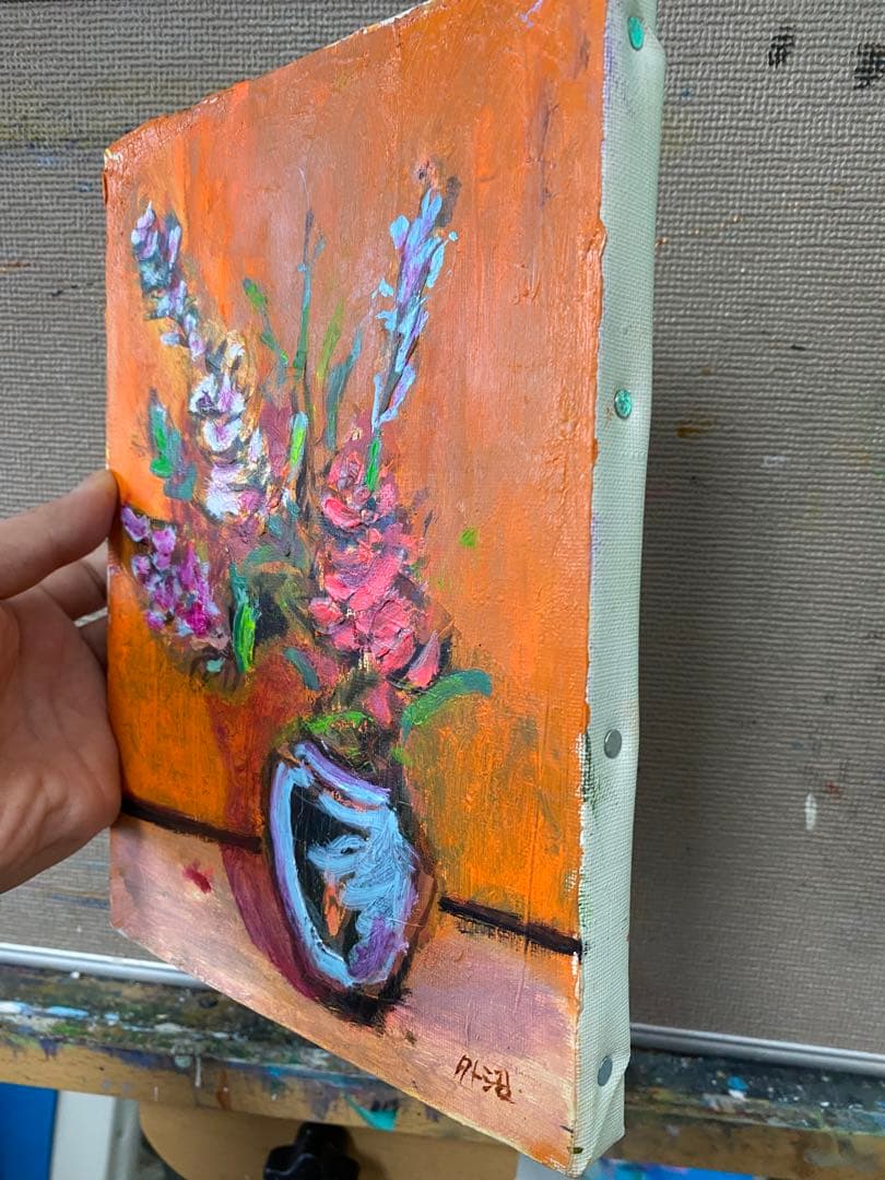 花瓶に生けた花の油彩画