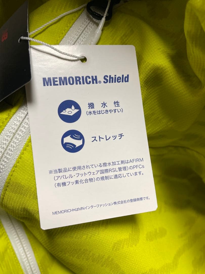 ★新品タグ付★ ニューバランスゴルフ ナイロンジャケット 総柄 デカロゴ 黄色