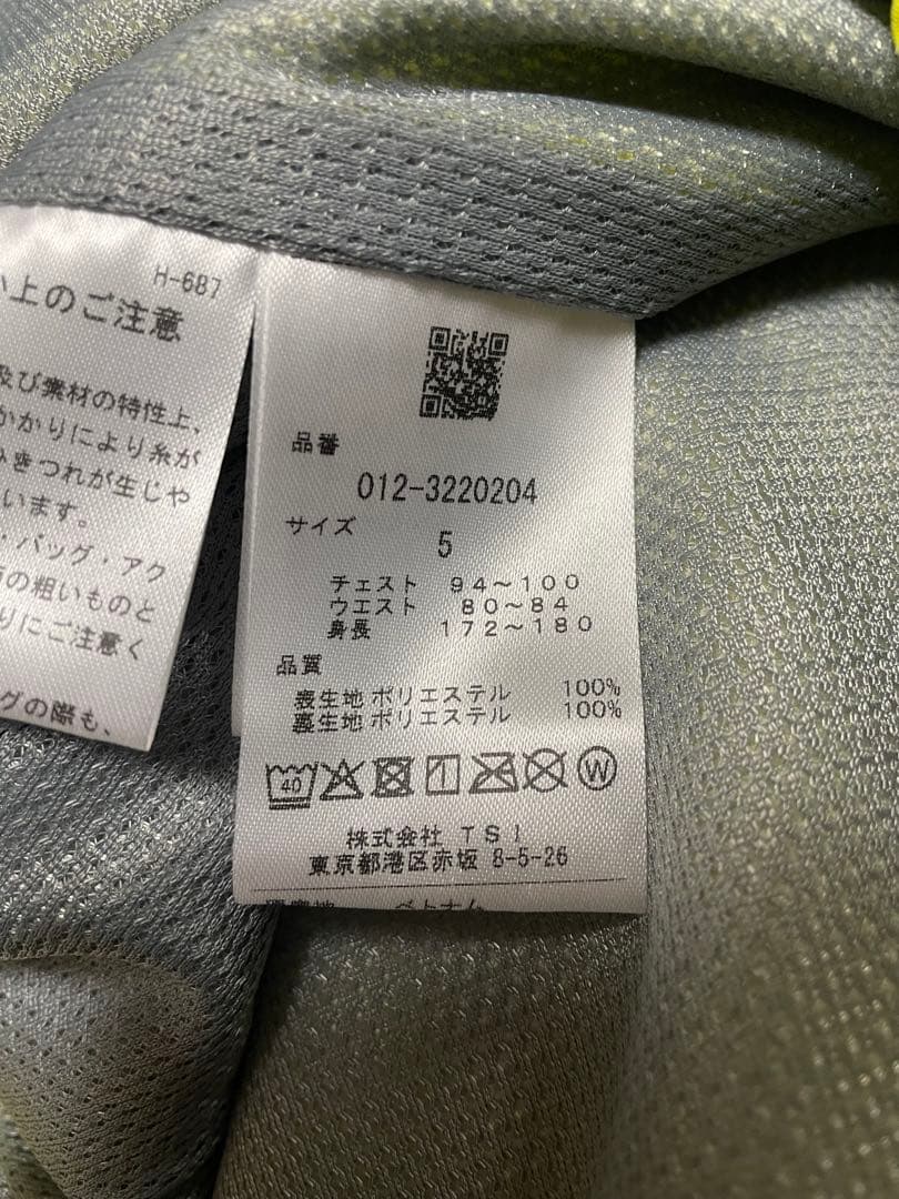 ★新品タグ付★ ニューバランスゴルフ ナイロンジャケット 総柄 デカロゴ 黄色
