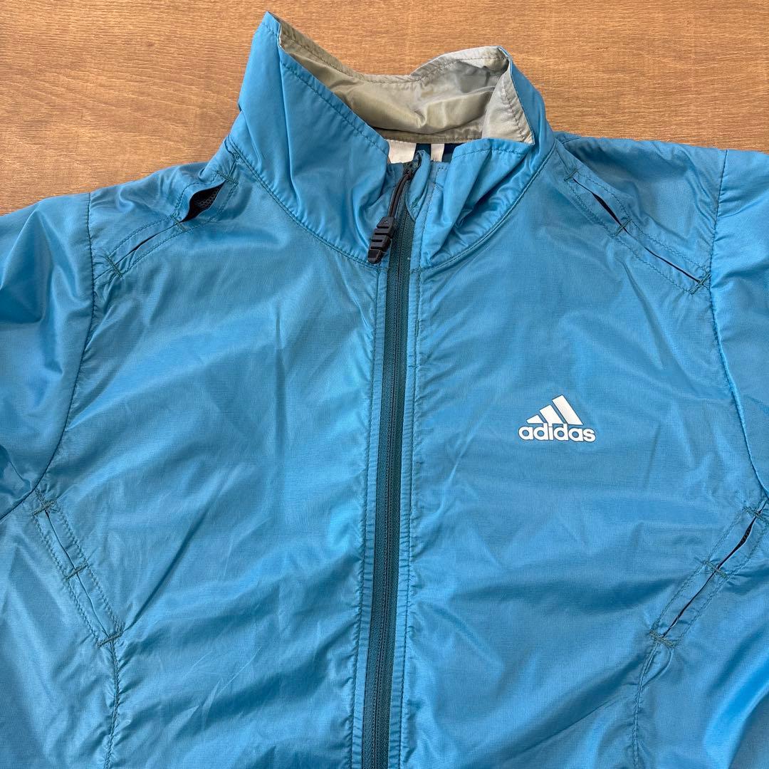 adidas ウィンドブレーカー レディース　水色