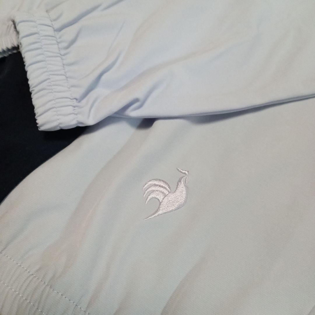 le coq sportif ウィンドブレーカー ネイビー/ライトパープル M