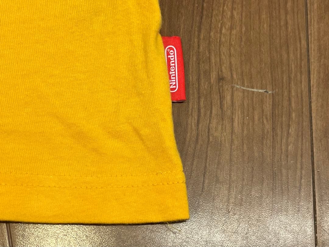 任天堂 TOKYO オフィシャル Tシャツ スーパーマリオブラザーズ オレンジS