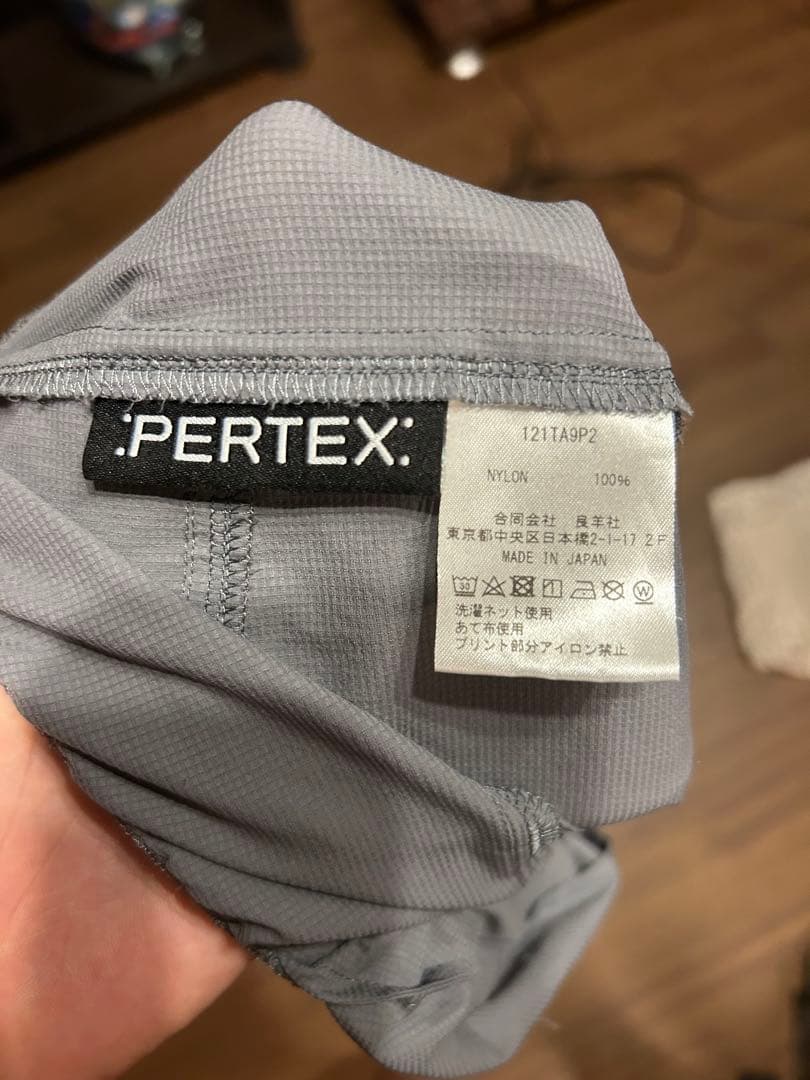 TANNUKI running clubグレーのショートパンツ