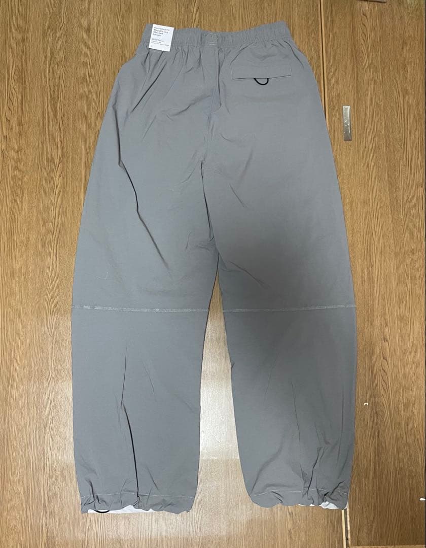 新品未使用　ナイキテックメンズ ウーブンオープンヘムパンツ　Mサイズ