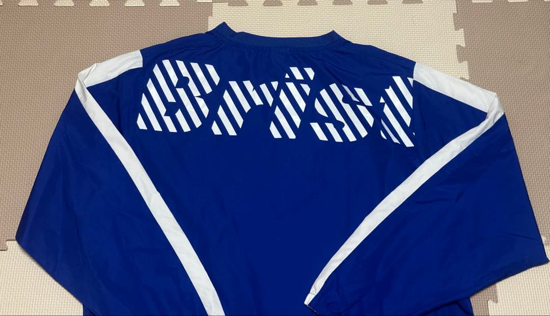 【未使用級】F.C.R.B. ブリストル ブルー ピステ L 背面ロゴ メンズ