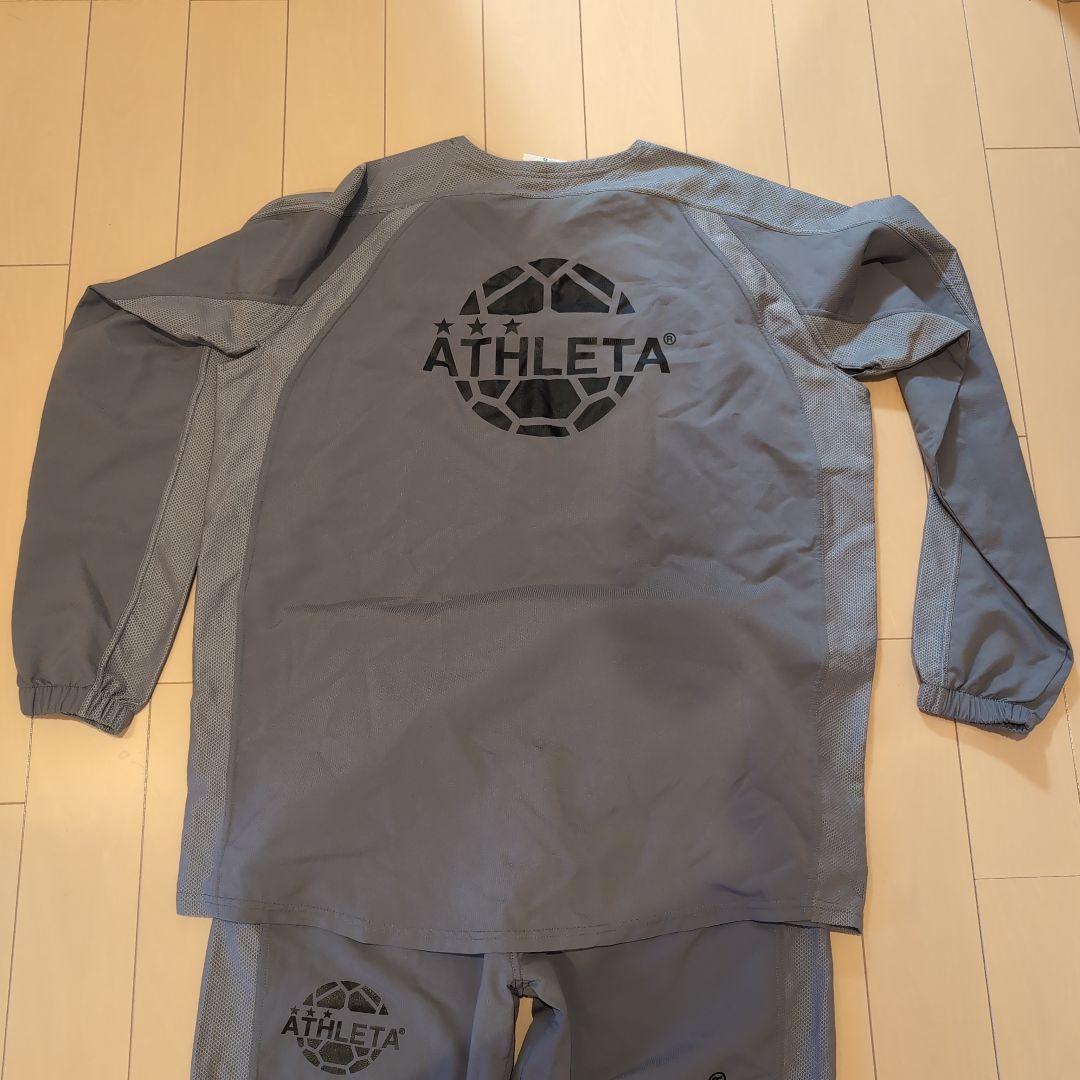 ATHLETA グレー ピステ・ウィンドブレーカー