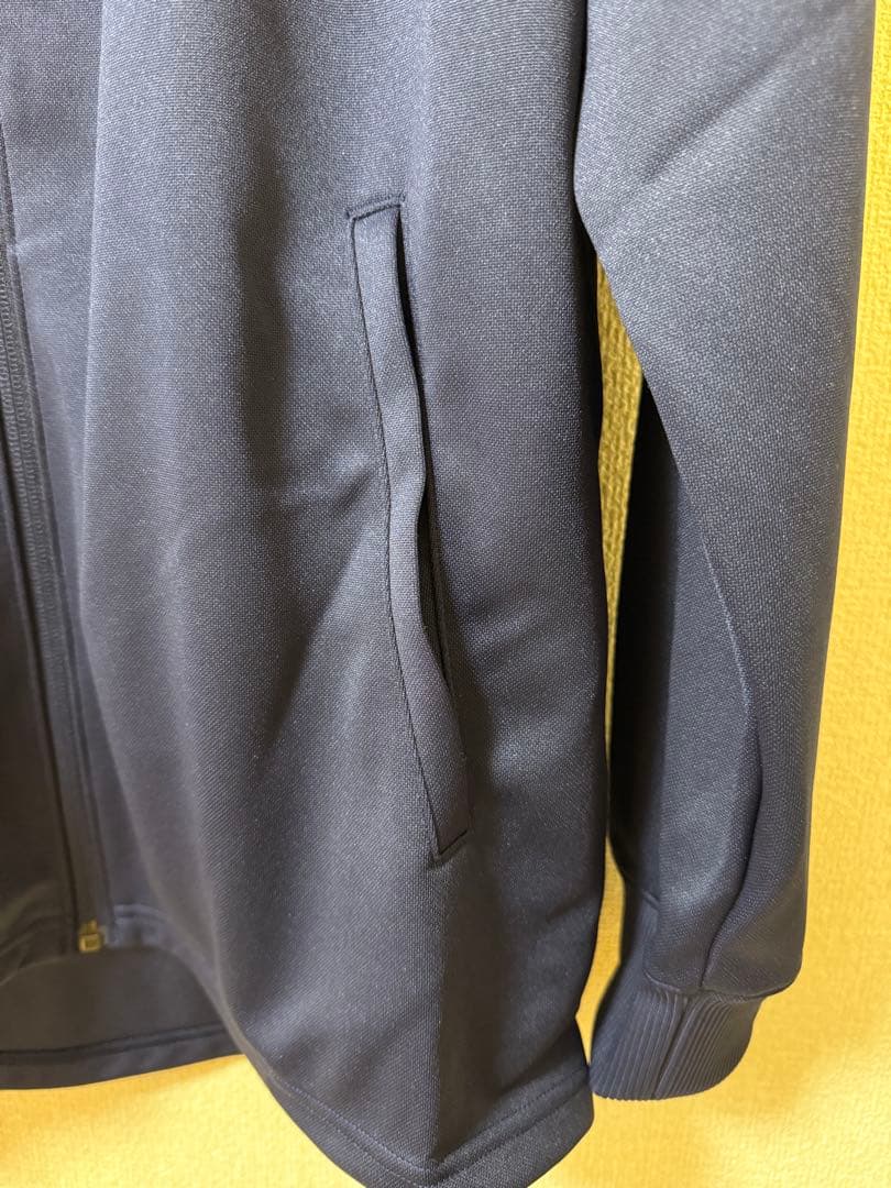 新品タグ付UNDERARMOURサイドラインジャケットXLネイビーUNISEX