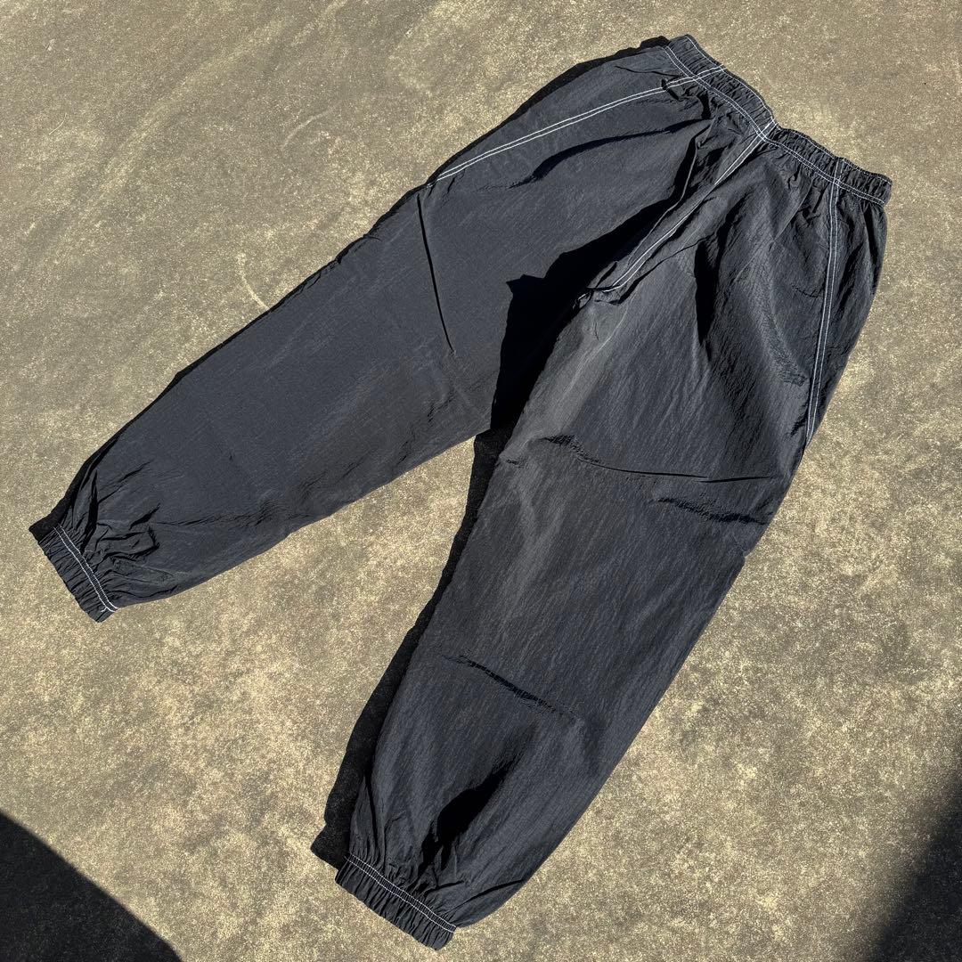 NIKE ナイキ スウッシュ ナイロンパンツ ステッチ トラックパンツ クロ M