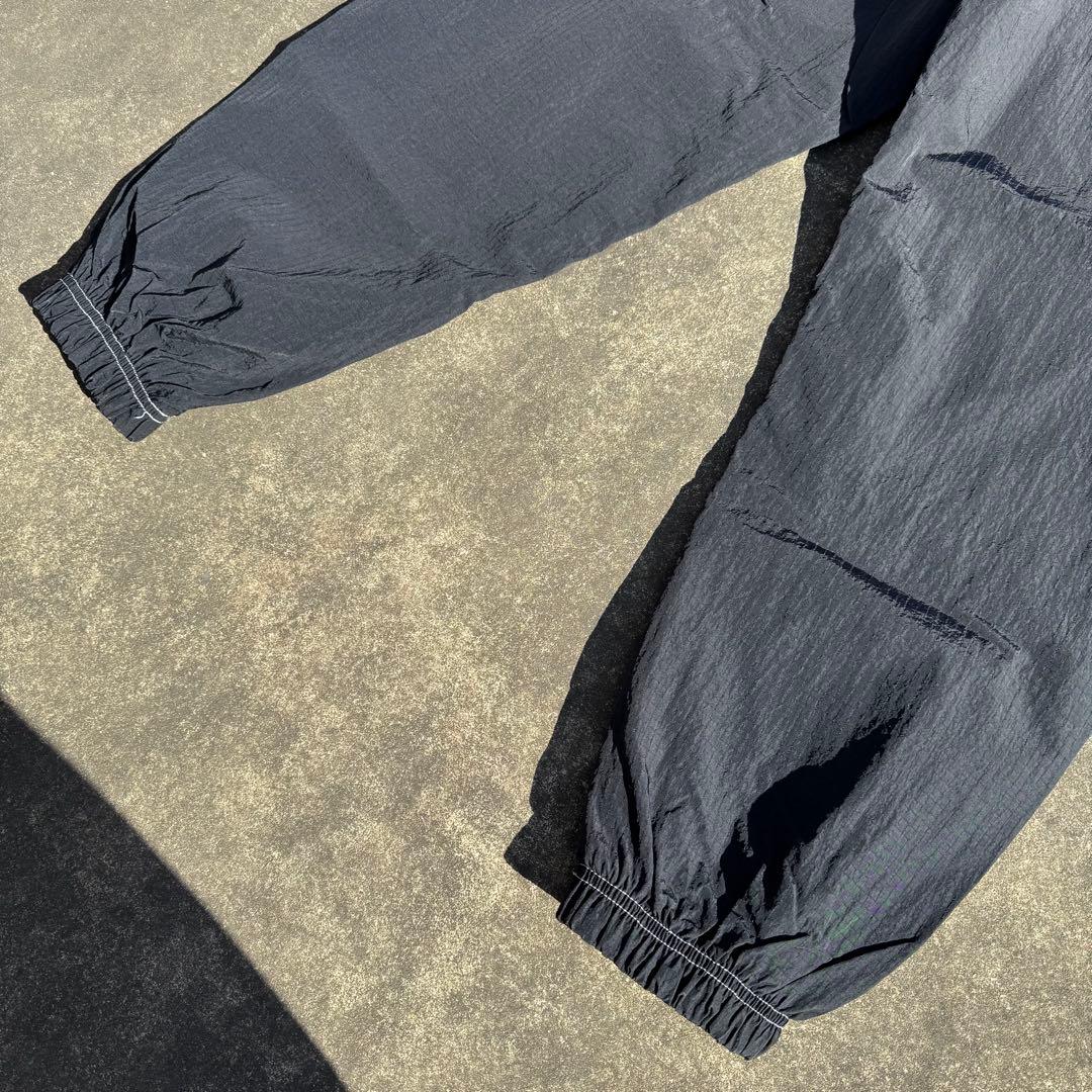 NIKE ナイキ スウッシュ ナイロンパンツ ステッチ トラックパンツ クロ M