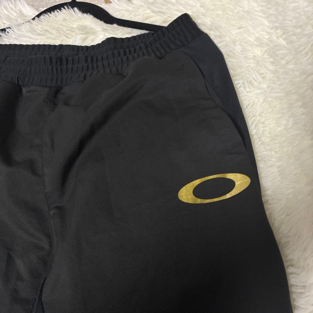 Oakley ブラックゴールド 薄手ソフトジャージ上下セット Lサイズ ゴルフ
