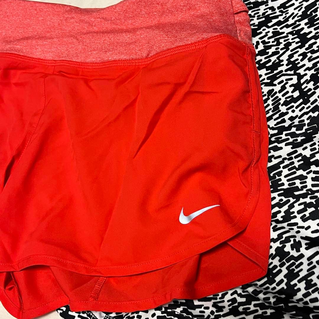 新品✨ナイキ NIKE ランニングウェア 上下セット 白黒 総柄 赤 Lサイズ