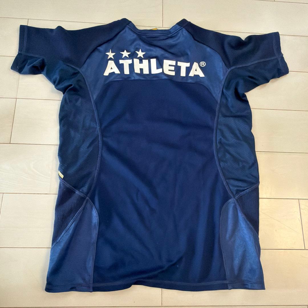 ATHLETA ネイビーシャツ 150サイズ　サッカー　プラクティスシャツ