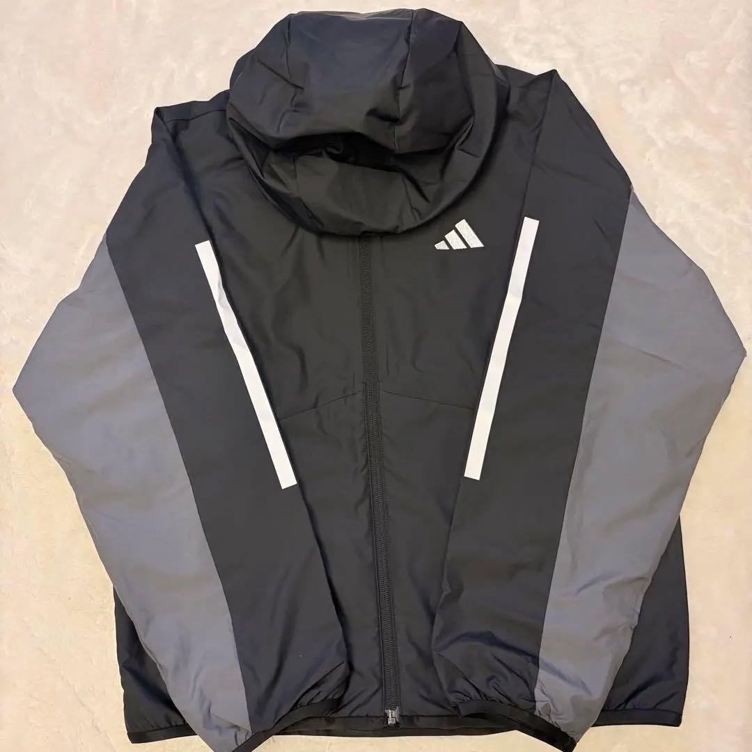 adidas レディースフード付きウィンドブレーカー 黒・グレー