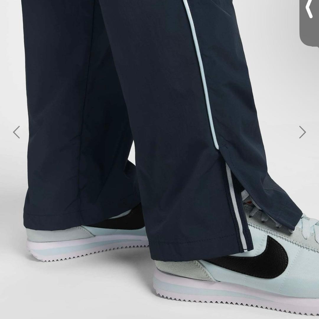 NIKE ウィメンズ ミッドライズ レペル アシンメトリカルウエスト パンツ