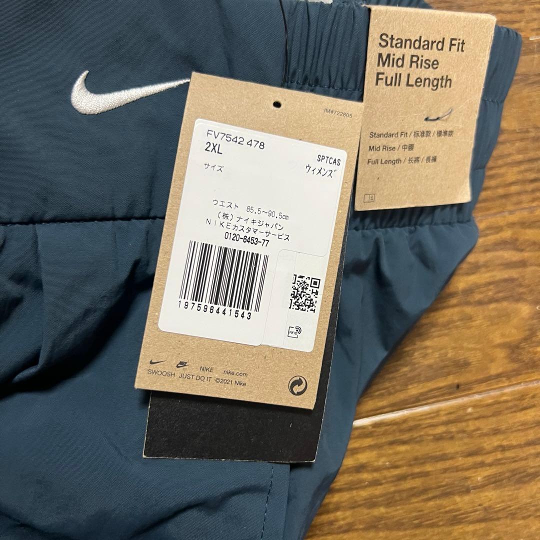 NIKE ウィメンズ ミッドライズ レペル アシンメトリカルウエスト パンツ