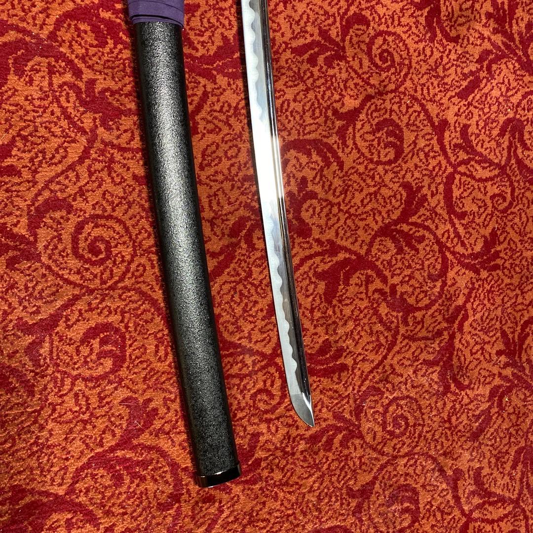 高級模造刀(刀袋付) 黄色柄黒鮫皮 龍彫透し銀丸鍔 黒梨地鞘
