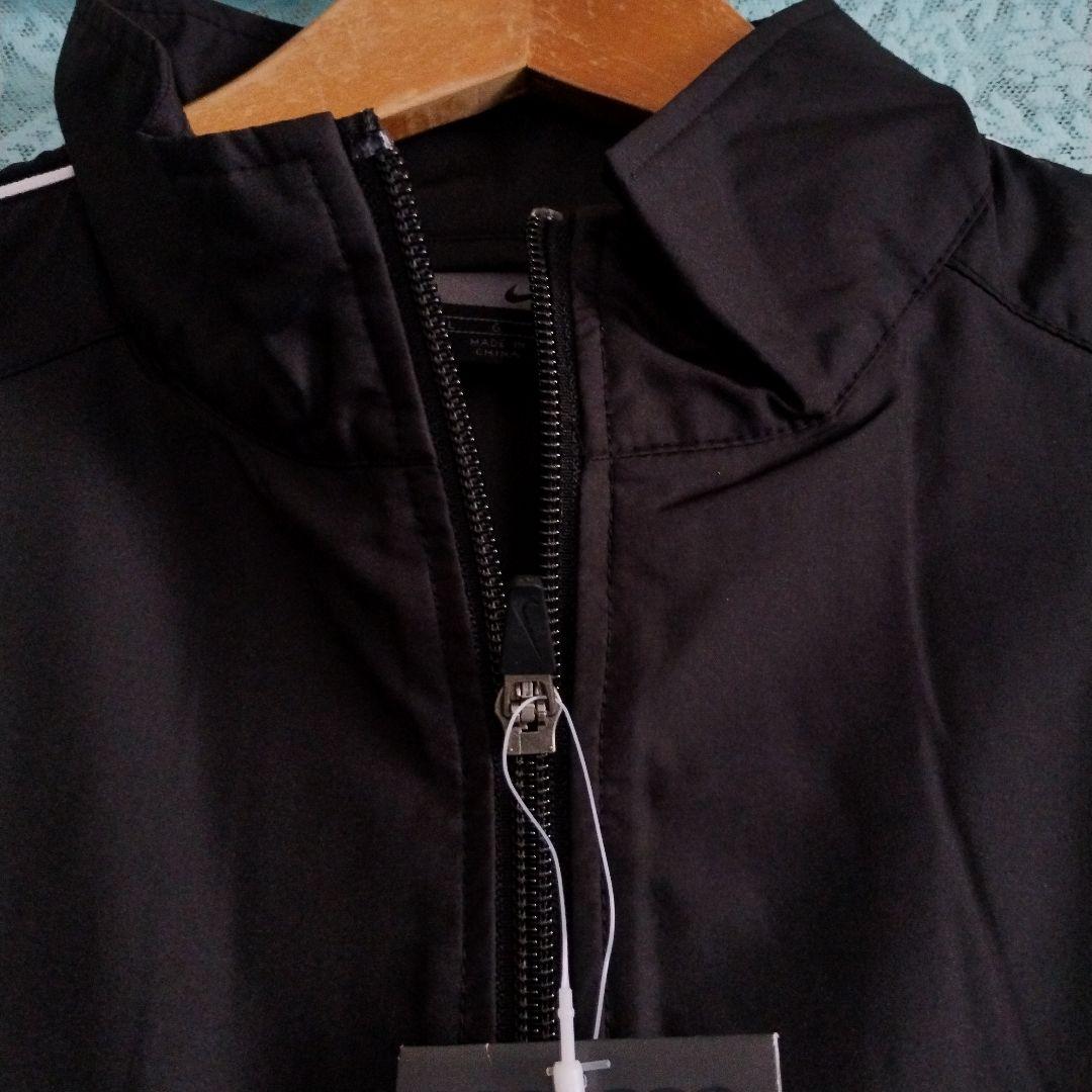 新品レディース Nike 上下セット上着 L サイズ 　パンツ M サイズ