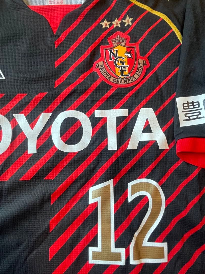 サッカーＪリーグ　名古屋グランパス 20周年記念ユニホーム　12サイズOサイズ