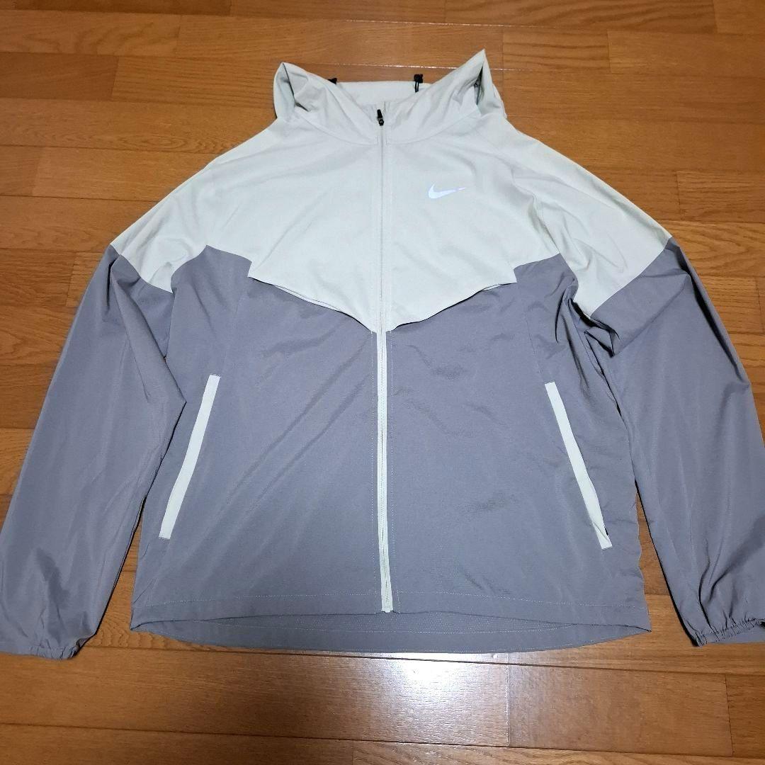 Nike ウィンドラ ンナー　レペル ランニングジャケッ　L ポケッ ト収納式