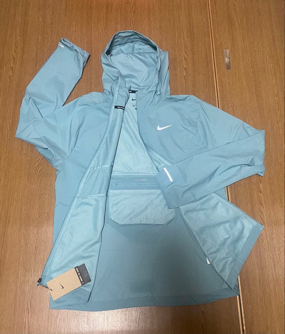 Nike ライトブルー ウィンドブレーカー
