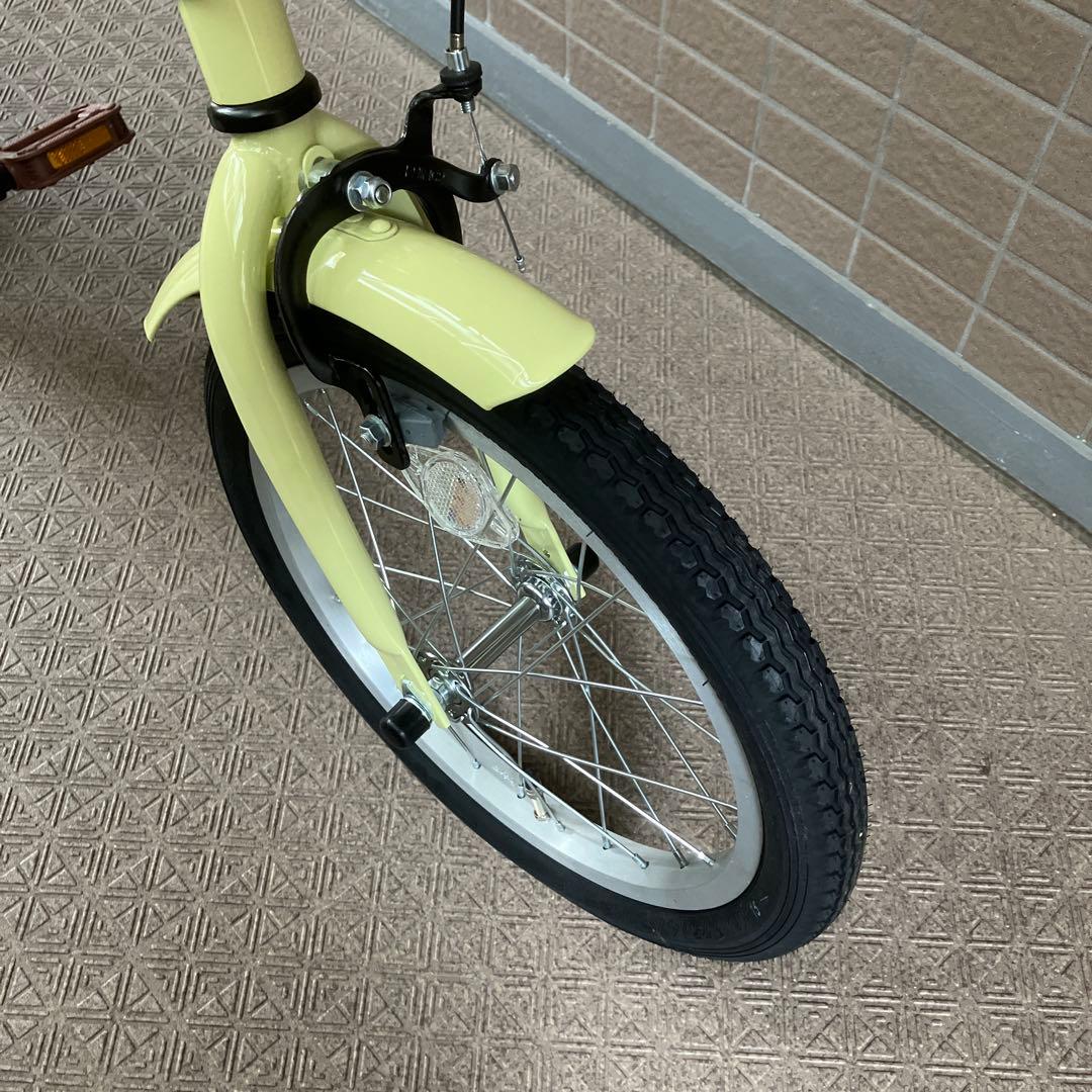折りたたみ自転車 淡い黄色
