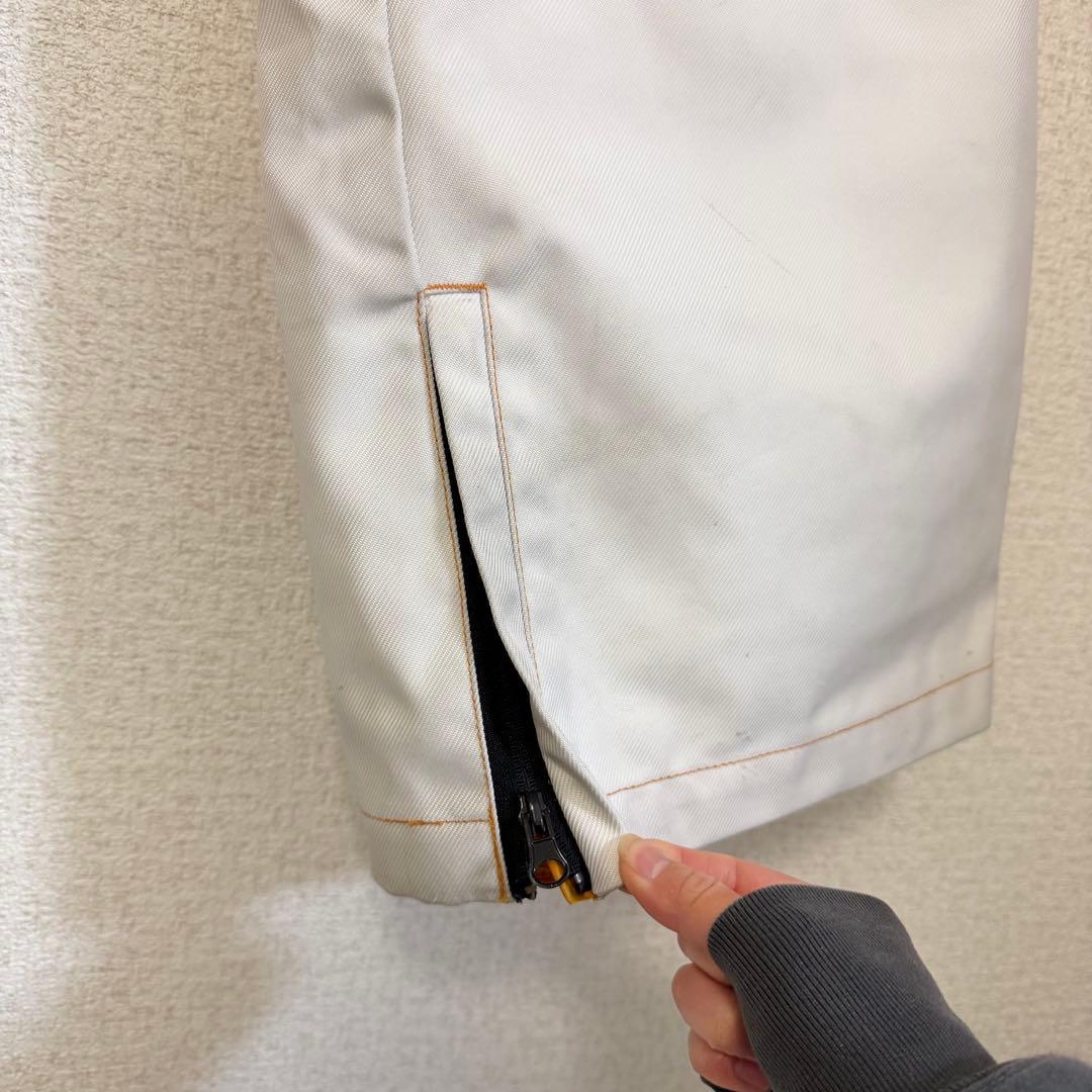 【nomis】スノーボードパンツ メンズL 白 オレンジ刺繍 総柄 ノーミス