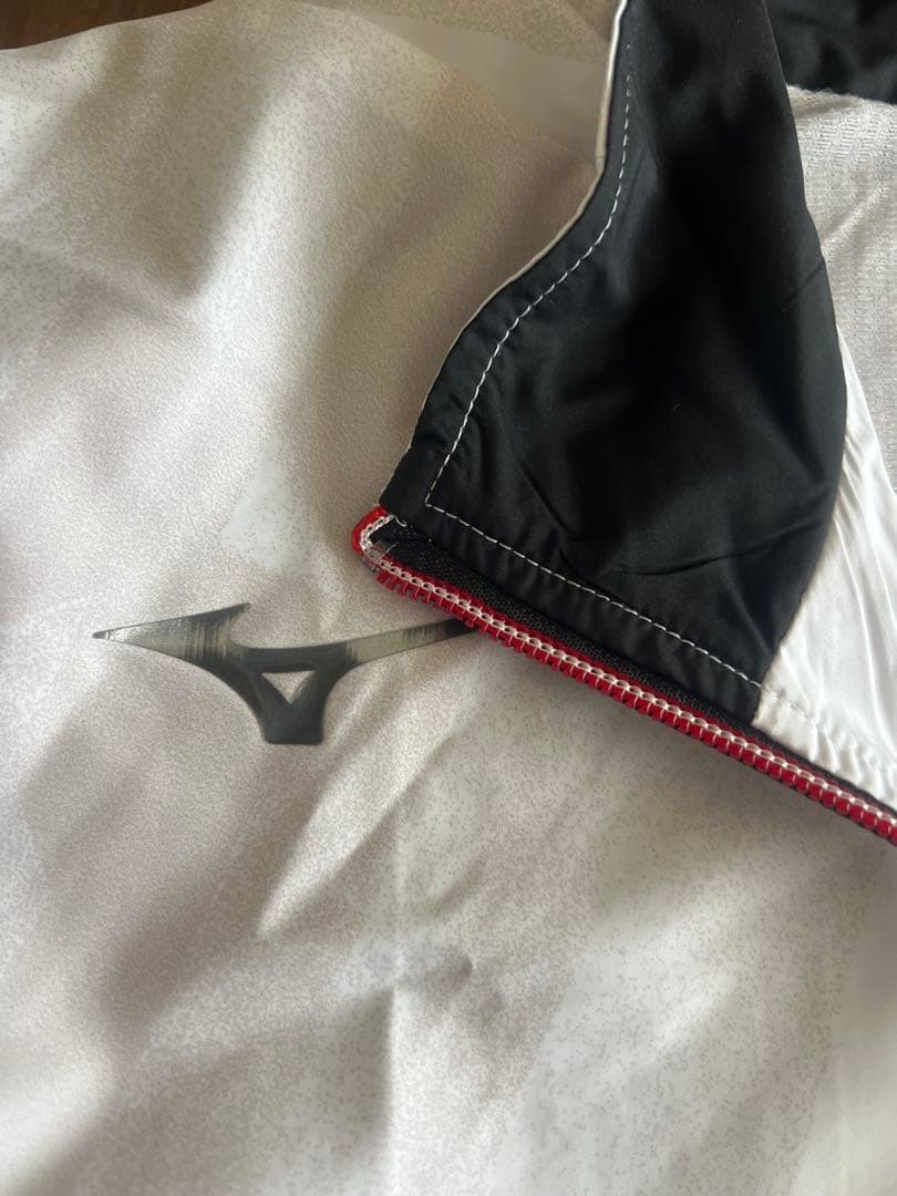 美品　MIZUNO ウォームアップ　ユニLサイズ　　32MEA541
