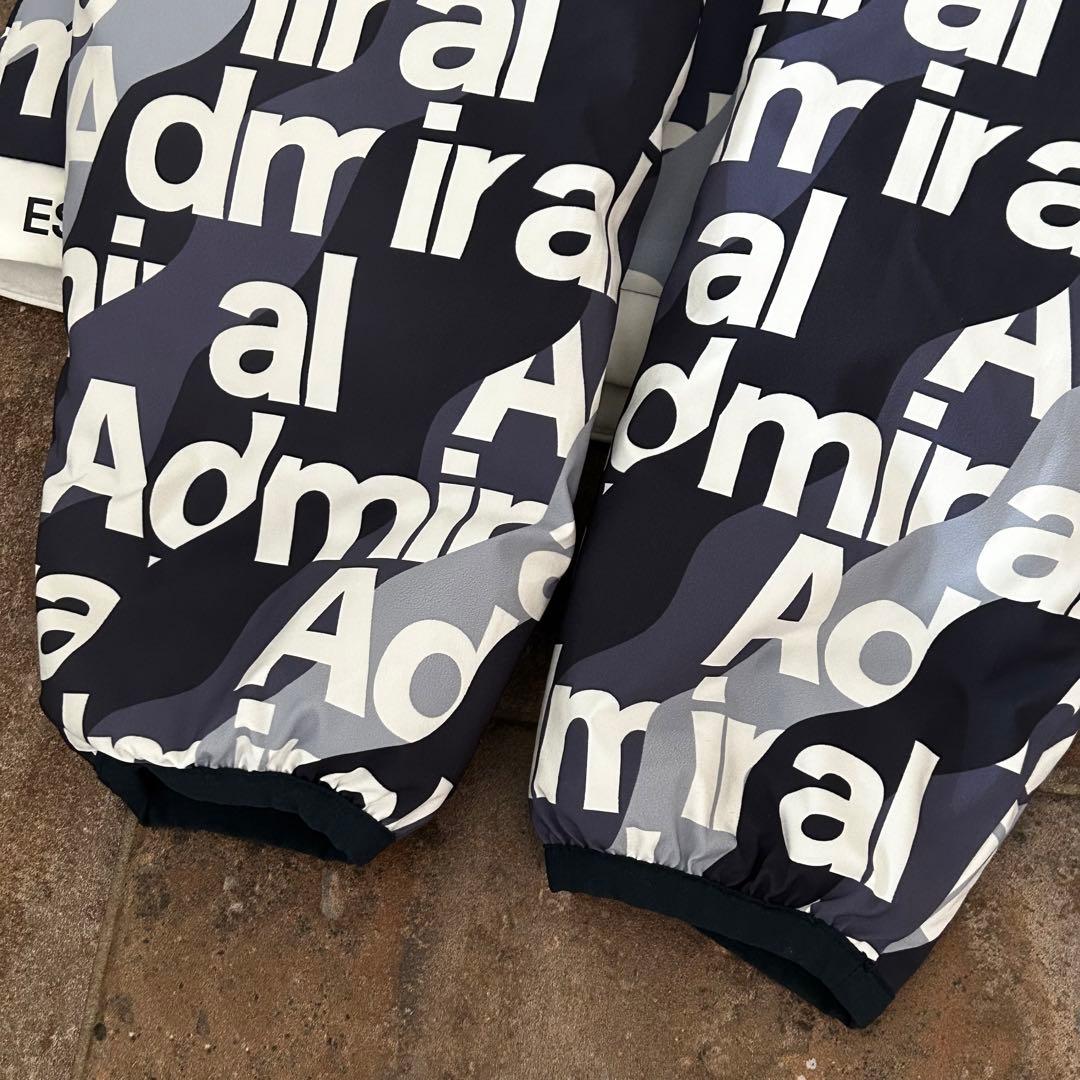 ADMIRAL GOLF ボトムロゴ 軽量パデッド　フーデッドジャケット　総柄