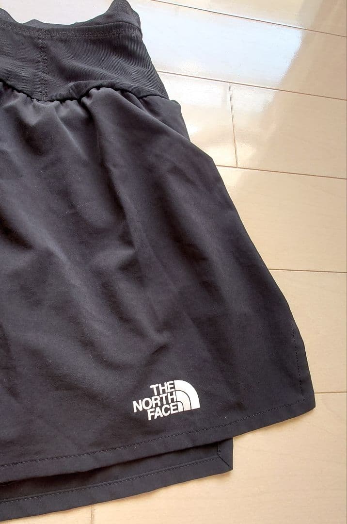 NBW62481 THE NORTH FACE レーシングスカート XL