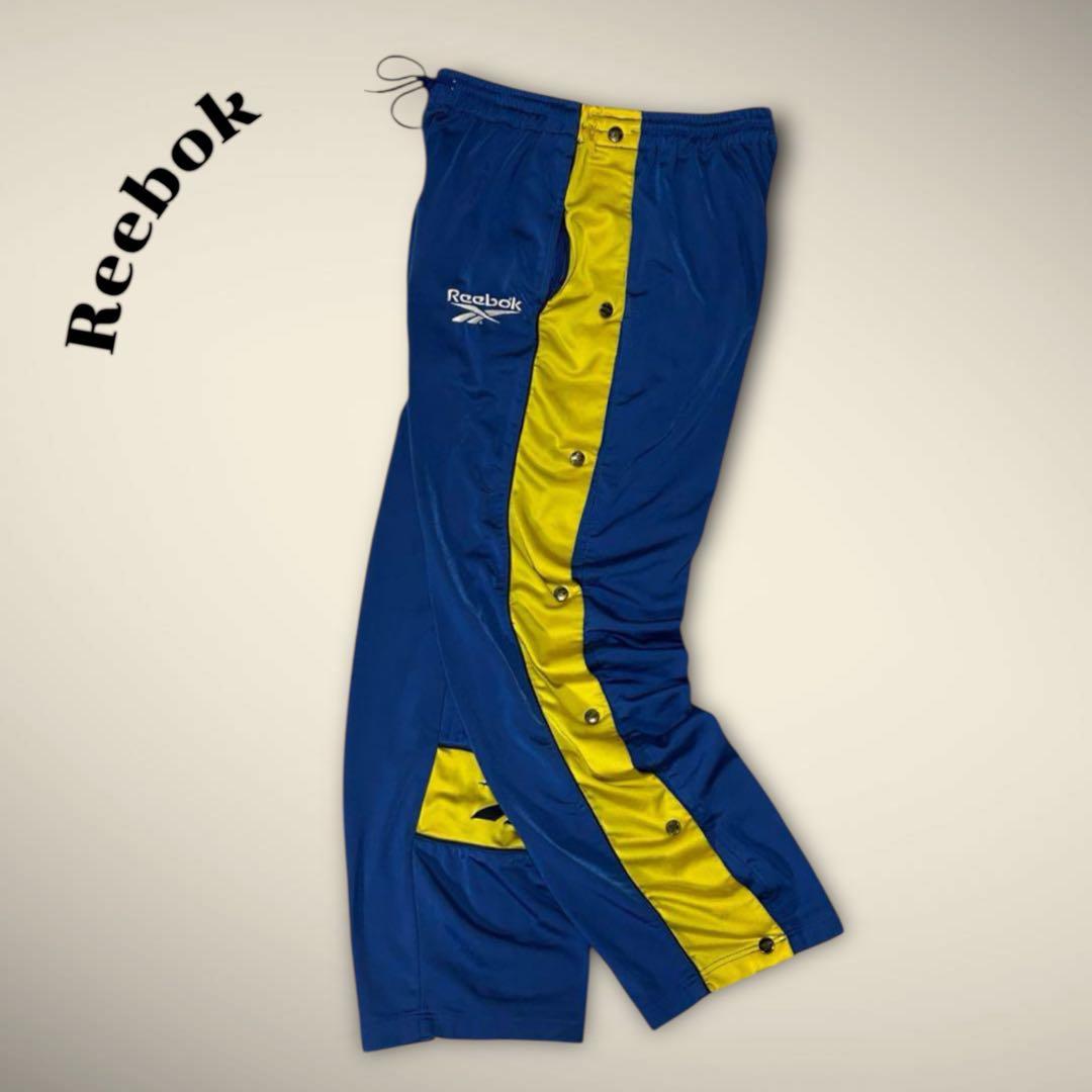 リーボック ReebokトラックパンツサイドスナップサッカーブレンビーIF青黄