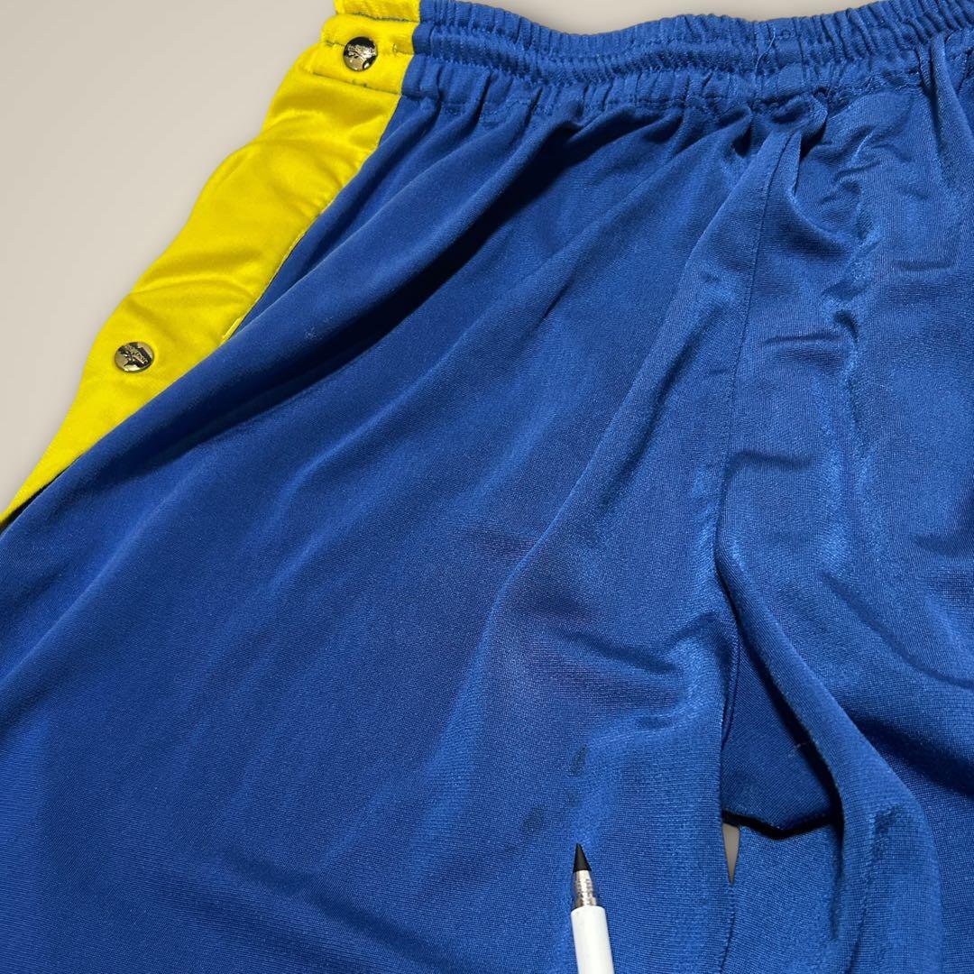 リーボック ReebokトラックパンツサイドスナップサッカーブレンビーIF青黄