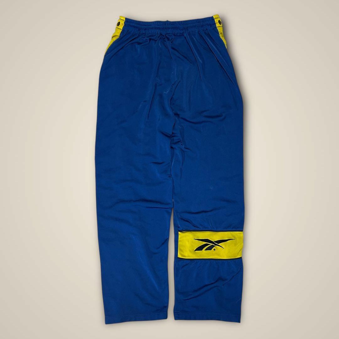リーボック ReebokトラックパンツサイドスナップサッカーブレンビーIF青黄
