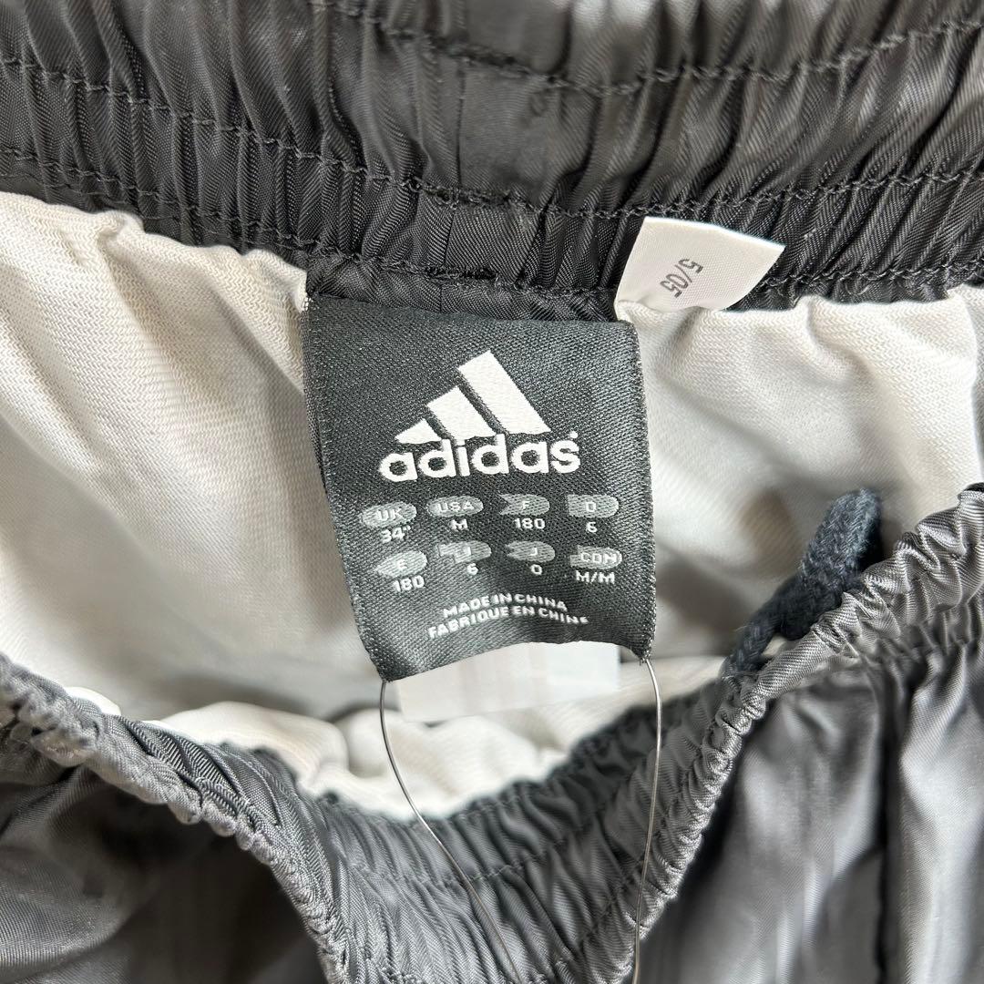 新品未使用　adidas ストライプジャージパンツ 黒