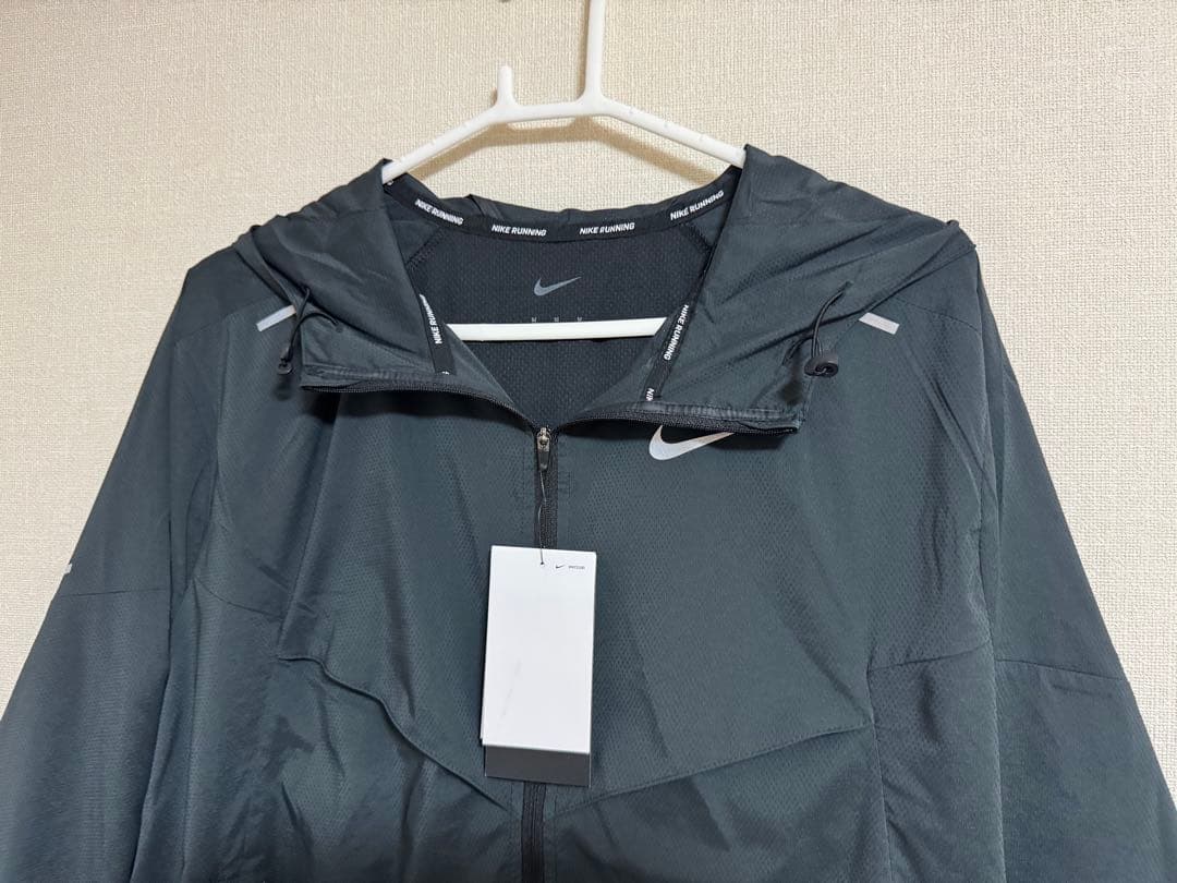 Nike ウィンドブレーカー ライトブルー