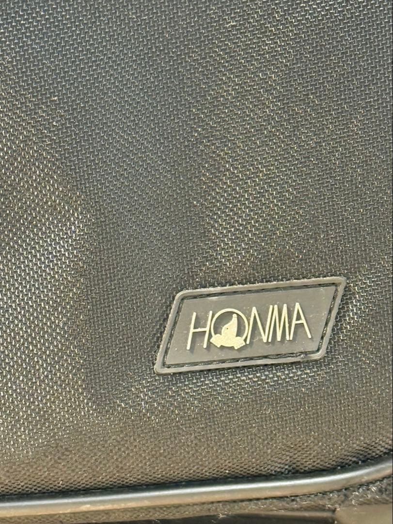 本間ゴルフ（HONMA GOLF）黒いボストンバッグ　キャリー付き