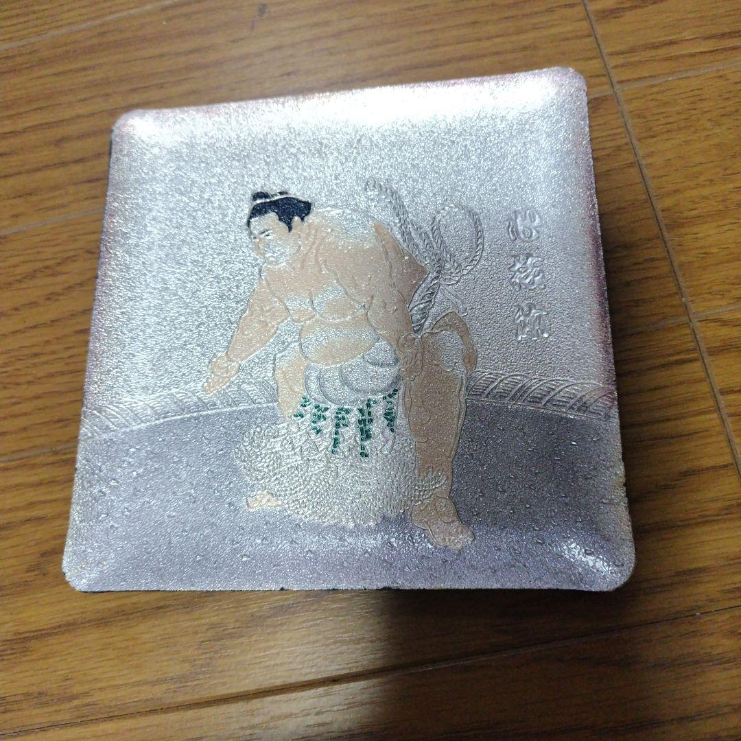 相撲柄の彫金