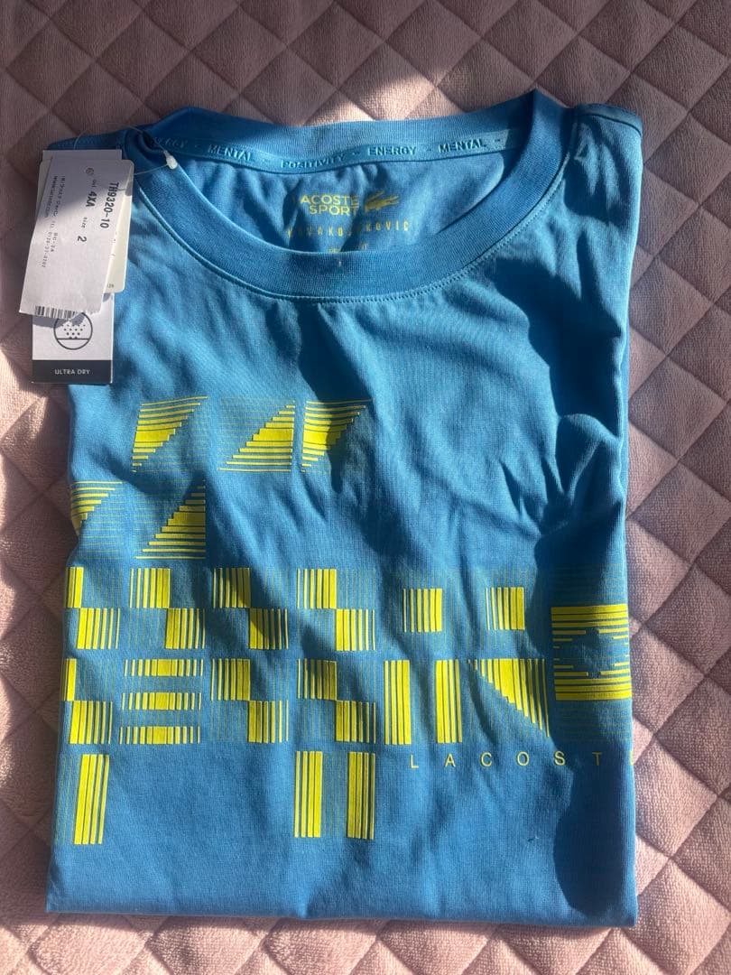 ラコステ グラフィックTシャツ 青 新品タグ付きジョコビッチ