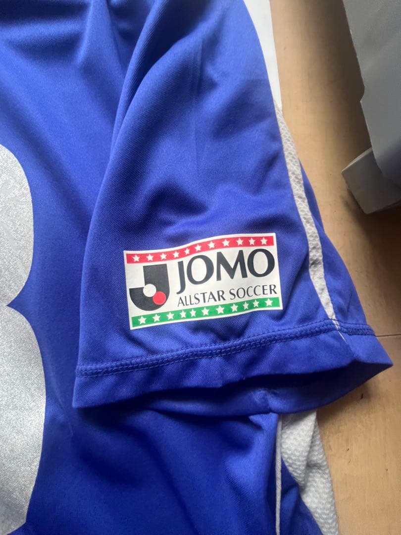 佐藤寿人さん JOMOカップ コンフィツトユニフォーム、タオルマフラー