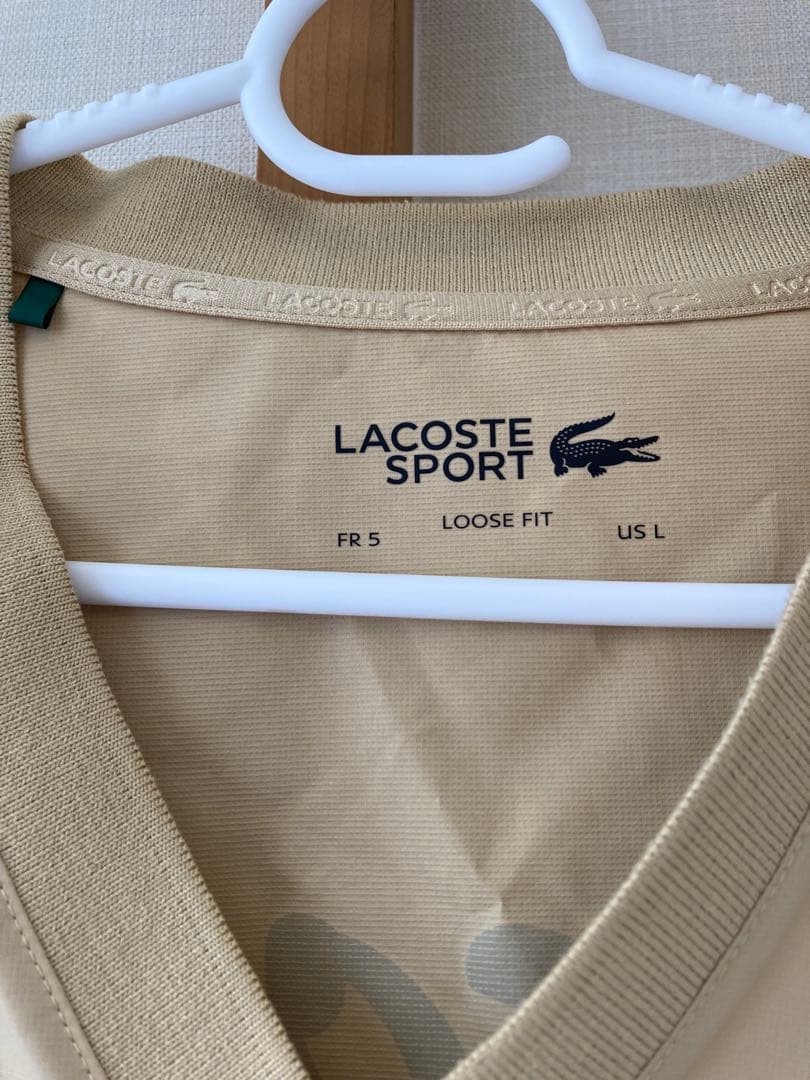 LACOSTE　ゴルフウェア　Vネックウィンドブレイカー　サイズUSのＬサイズ