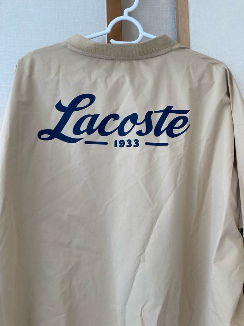 LACOSTE　ゴルフウェア　Vネックウィンドブレイカー　サイズUSのＬサイズ