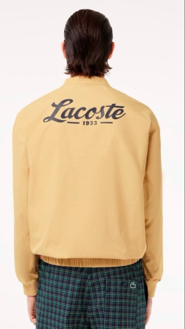 LACOSTE　ゴルフウェア　Vネックウィンドブレイカー　サイズUSのＬサイズ