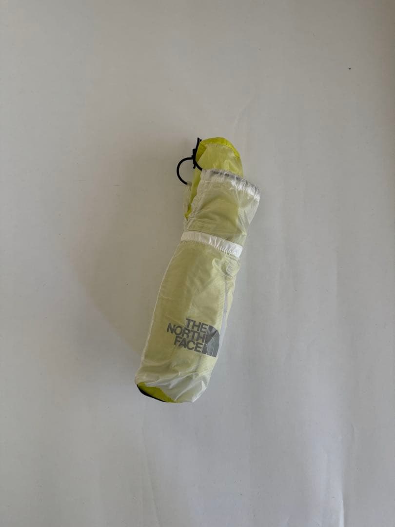 THE NORTH FACE 軽量フード付きウィンドブレーカー イエロー/グレー