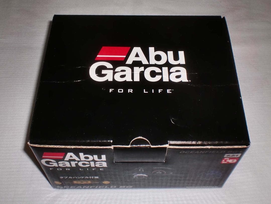Ａｂｕ　オーシャンフィールドＢＧ【左巻】スペアハンドル付　新品（※箱折り目有り）