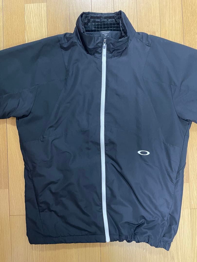 オークリーOAKLEY中綿ジャケット メンズL ゴルフ 防寒 ブルゾン 黒 秋冬