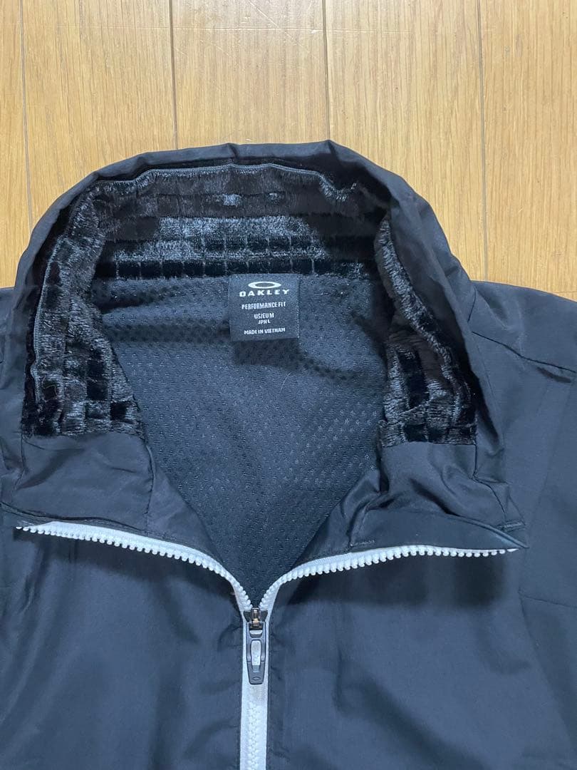 オークリーOAKLEY中綿ジャケット メンズL ゴルフ 防寒 ブルゾン 黒 秋冬