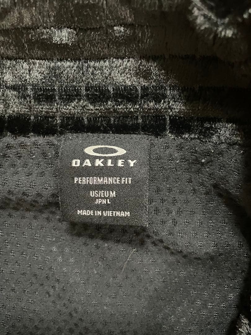 オークリーOAKLEY中綿ジャケット メンズL ゴルフ 防寒 ブルゾン 黒 秋冬