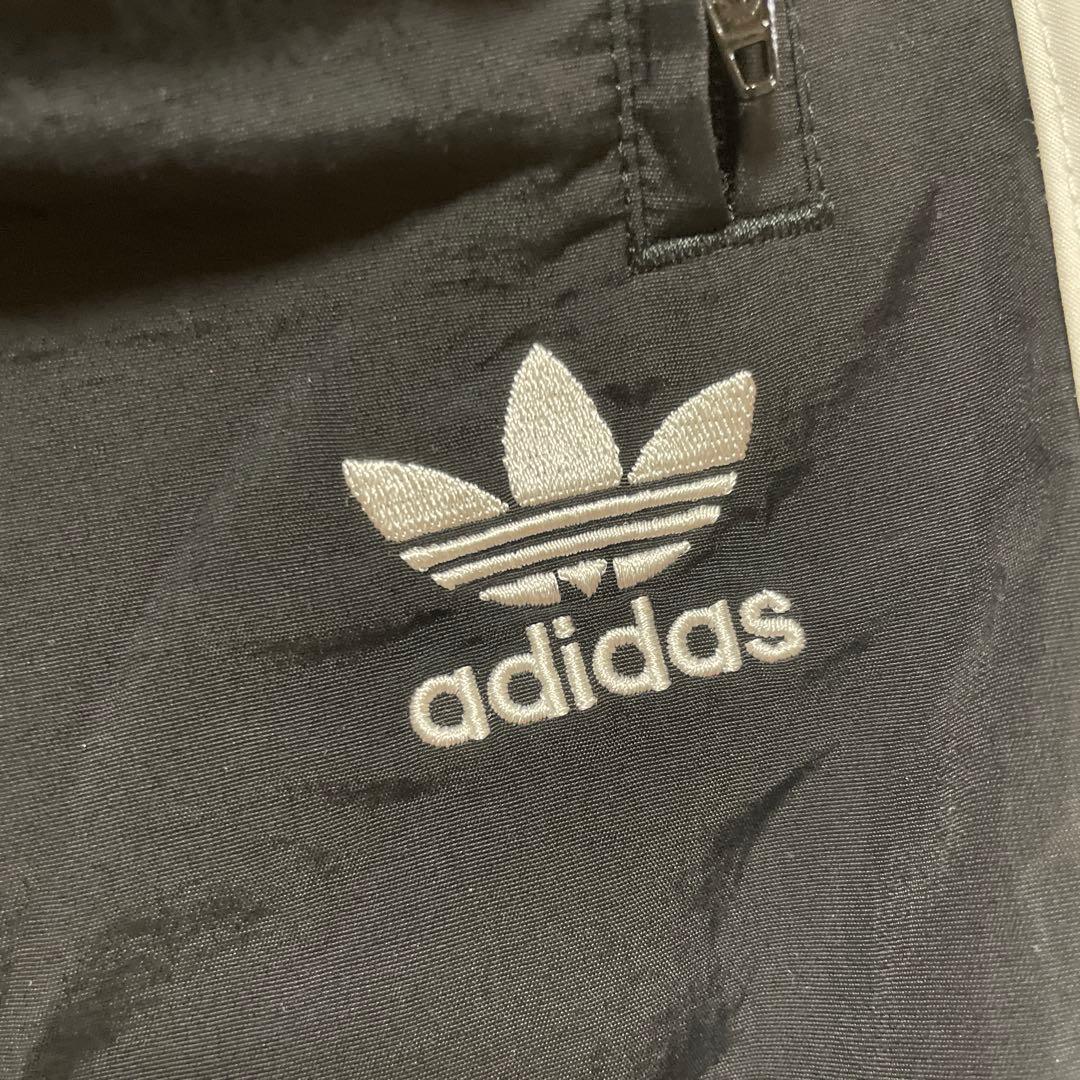 adidas アディカラーウーブンファイヤーバード トラックパンツIT2501