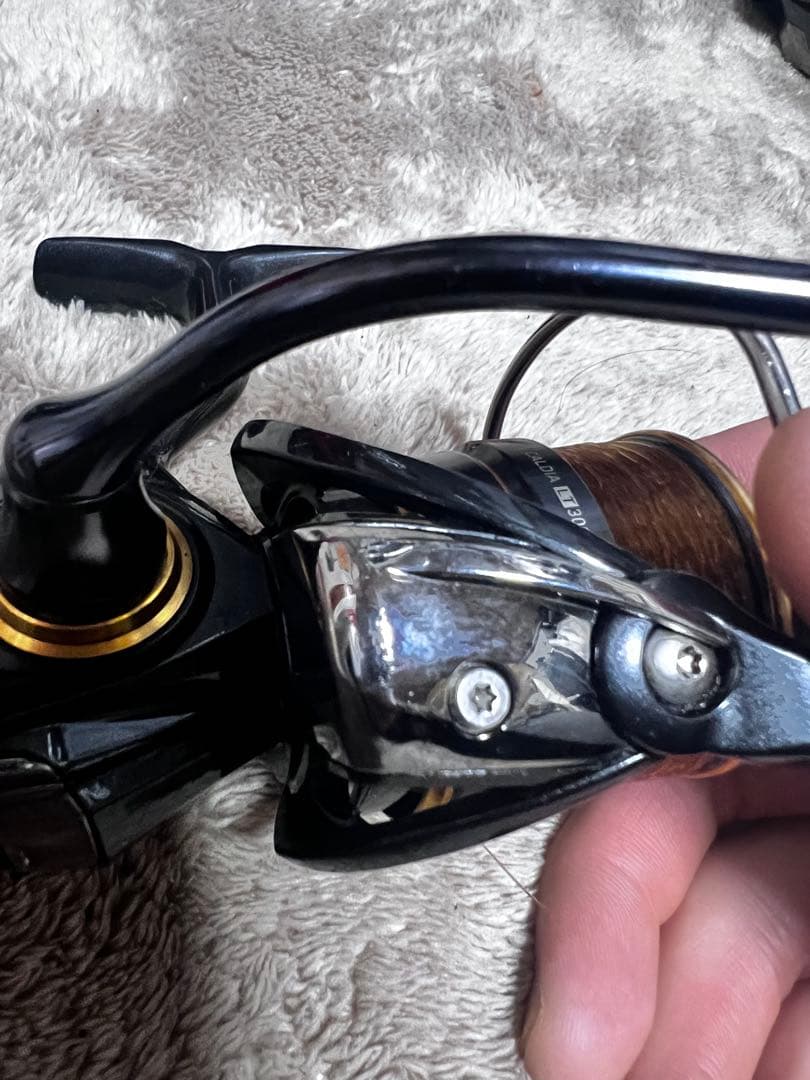 Daiwa スピニングリール 黒・金 カルディア3000XH