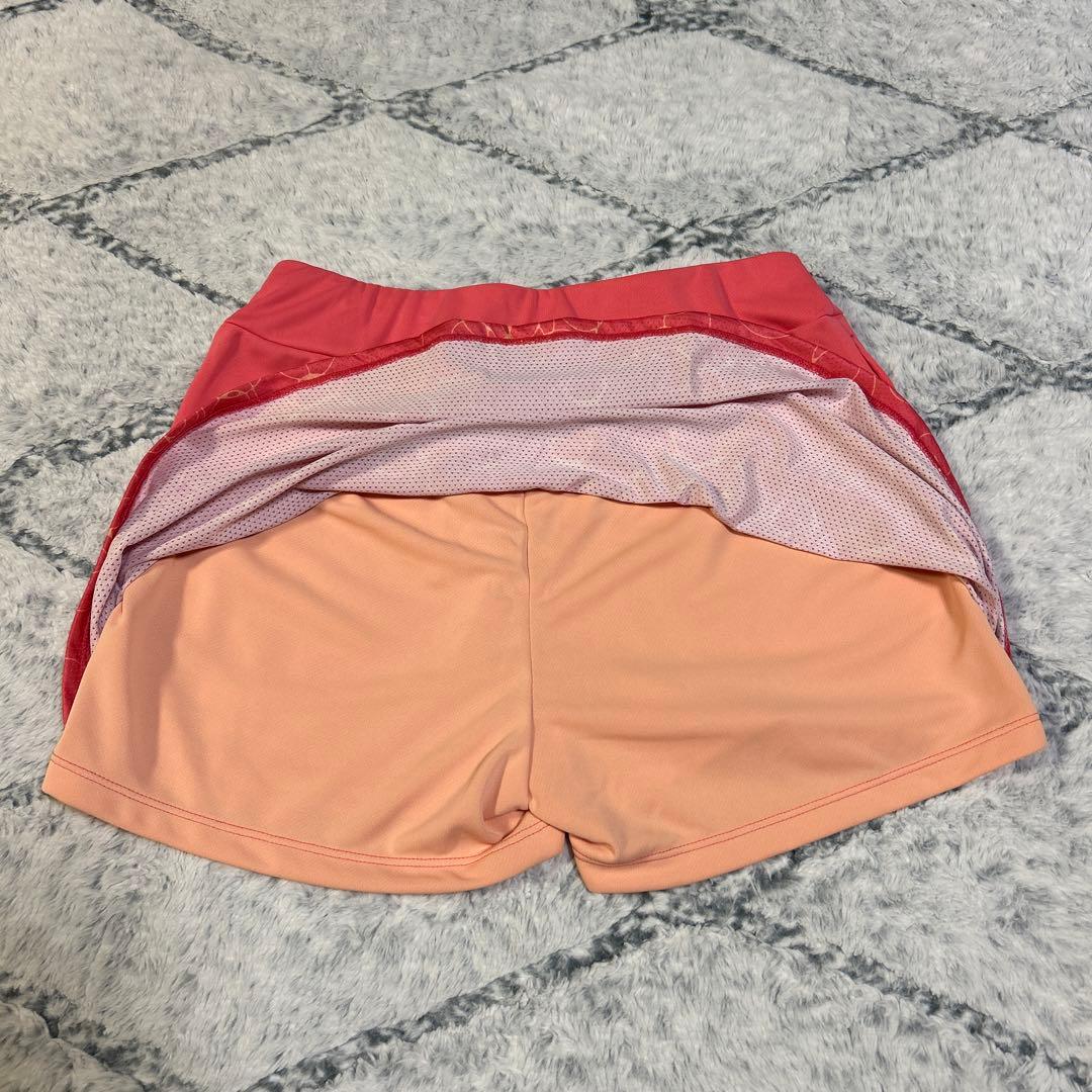 rocheピンク テニスウェア Vネック ショートパンツ付き（M）後ろスカート風